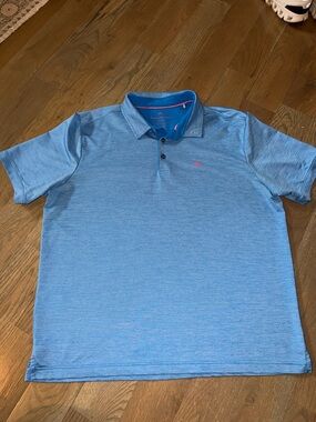 Tommy Bahama Heathered Light Blue Polo with Pink Logo